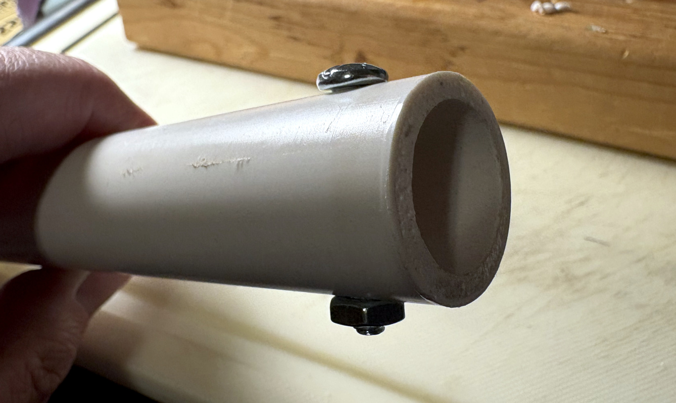 Hole drilled and stopper screw and nut installed