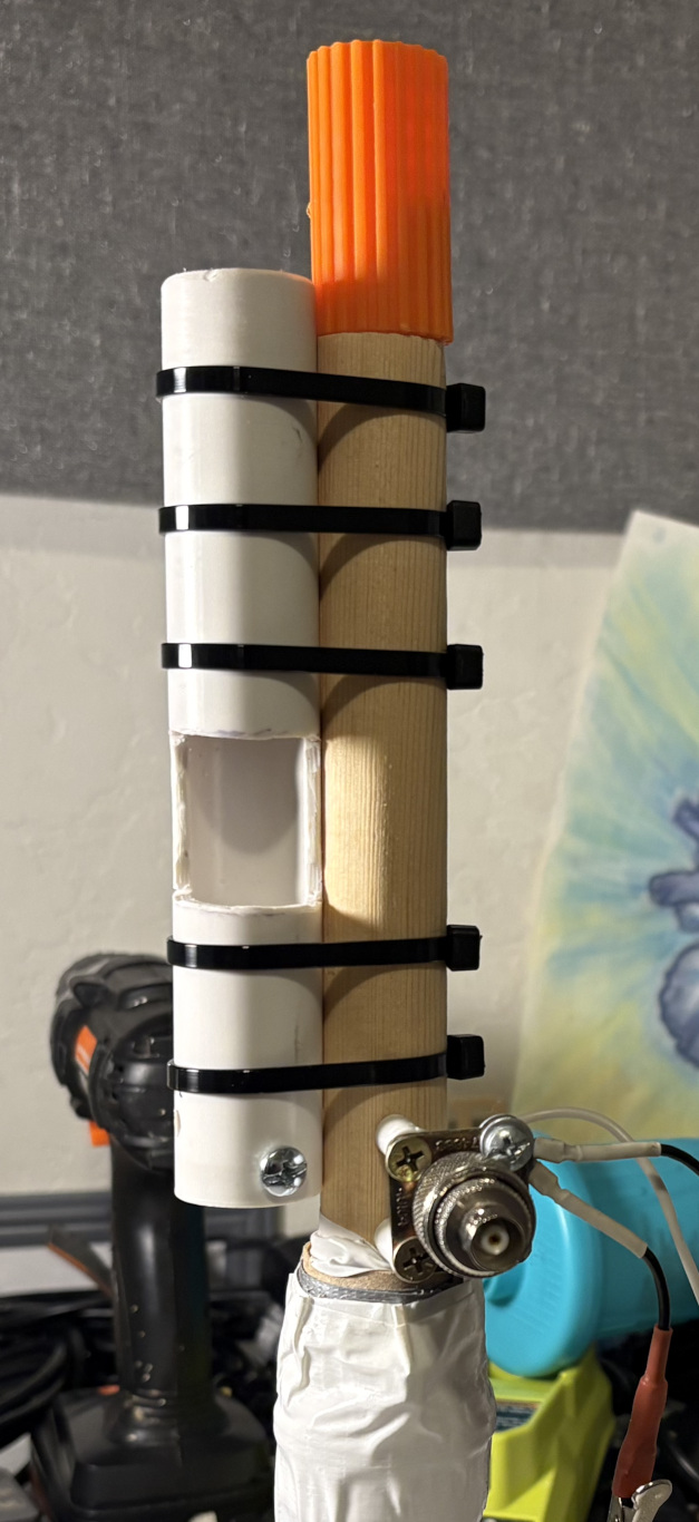 PVC pipe holder wire-tied to bottom of the original paint-pole antenna